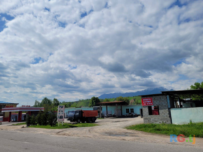 Земельный участок с постройкой